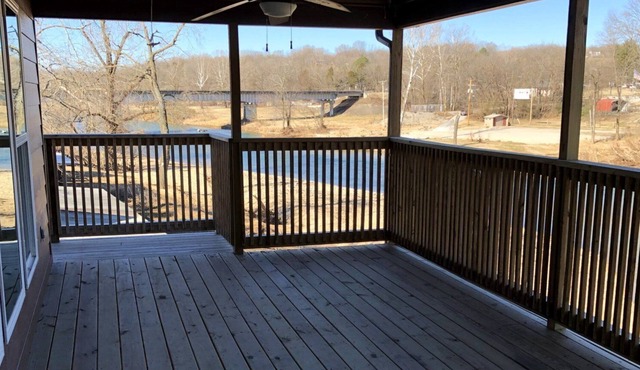 Beach house-style cabin on the Elk River in Pineville, Missouri