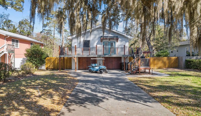 Beach house w/FREE Golf Cart & Fire Pit!