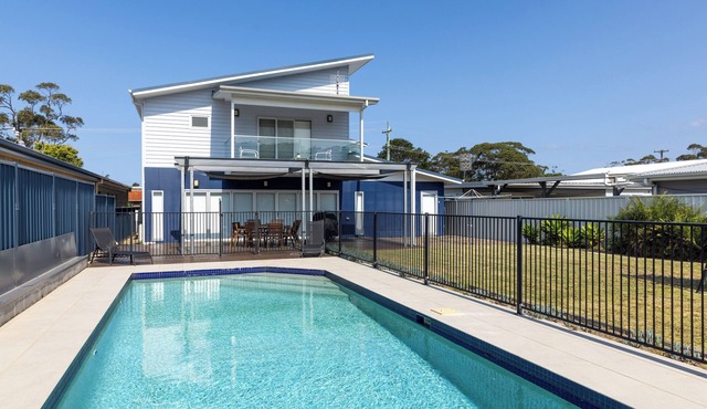 BEACH KING family home with a wonderful pool and play equipment close to beach