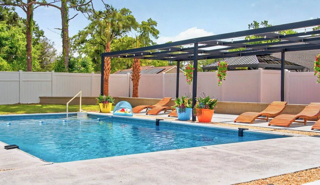 Beach Rental with Private Pool & Outdoor Entertainment for Up to 12 Guests!