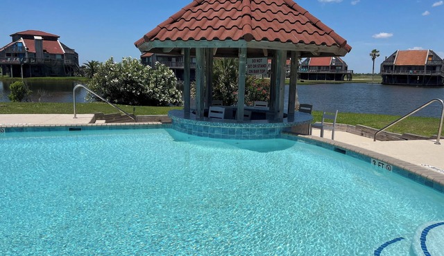 Beach Retreat Minutes to the Beach and just steps to the Pool!