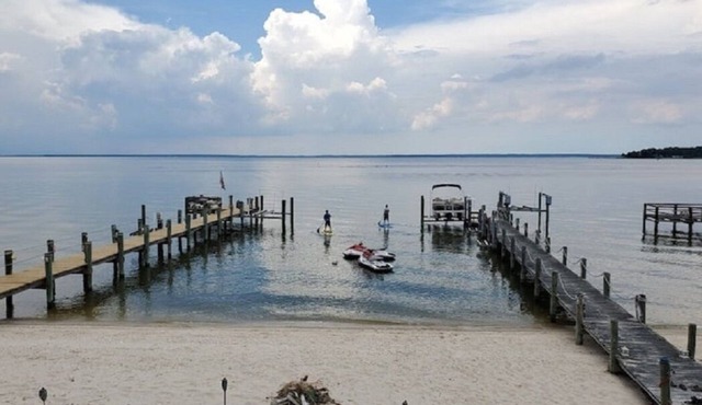 Beach & River Retreat. Spectacular house with private sand beach and hot tub!