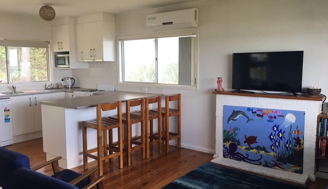 Beach Side Cabin - neat and tidy with Uninterrupted views of the Bay