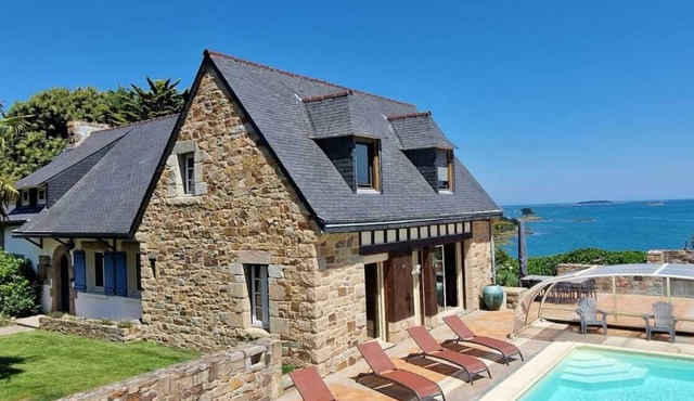 Beach view villa at the end of the garden covered swimming pool heated all year round