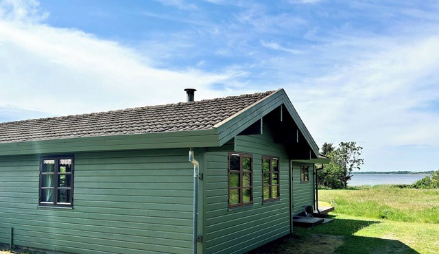 Beachclose log cabin on Mors with a view
