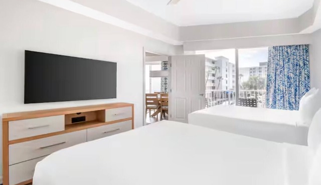 Beachfront 2BR Escape Near Daytona Speedway, Pool & Hot Tub Relaxation