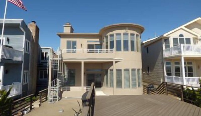 Beachfront beauty! First floor-step out your back door to your own deck and onto beach