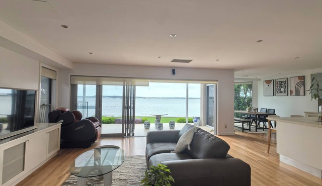 Beachfront Bliss: 4BR Villa Direct Beach Access