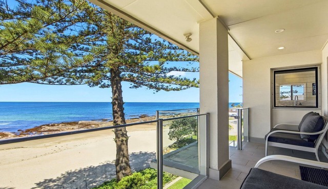 Beachfront Breeze - Family Getaway by HolidayCo.