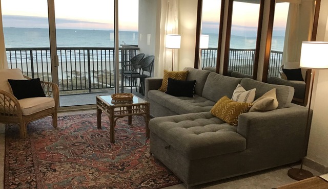 Beachfront condo on East Beach. Gulf, bay views. EV charger. Full kitchen, wifi.