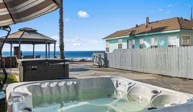 BEACHFRONT COTTAGE LOWER UNT ON THE STRAND IN OCEANSIDE, TWO-BED AND ONE-BATH