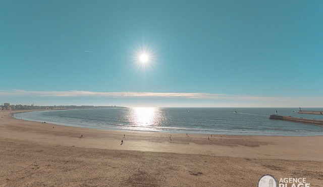 Beachfront 1-Bedroom Apartment with Garage, Balcony, and Close to Amenities