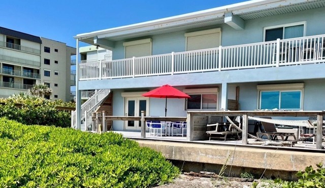 Beachfront ground floor condo with deck and heated pooln