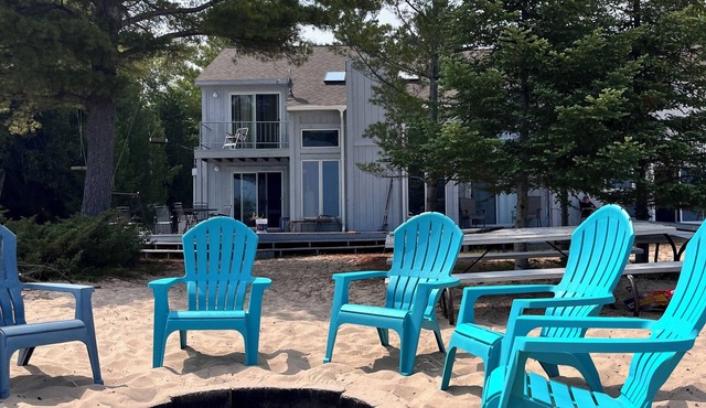 Beachfront Home on Lake Huron, clean sandy beach. Fall for the changing colors!