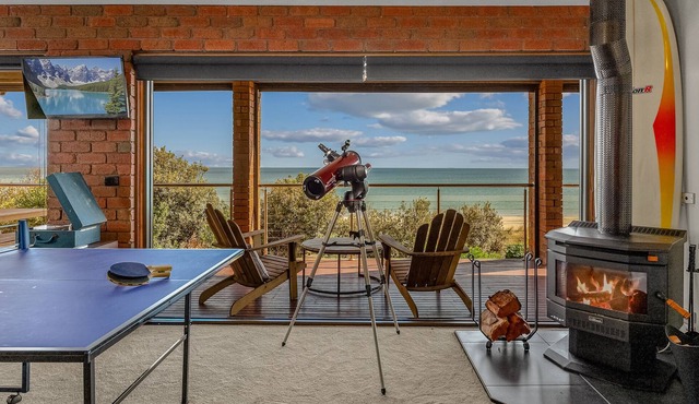 Beachfront home with direct beach access and 180 degree bay views!