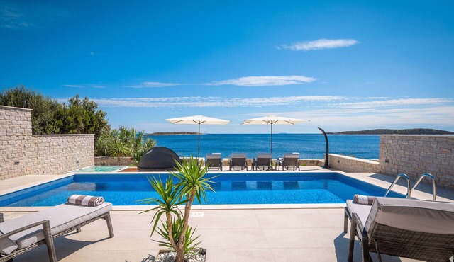 Beachfront house with Pool and Jakuzzi -maximum comfort and privacy .