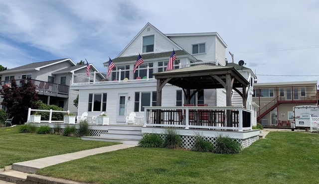 Beachfront vacation on Crystal Lake, downtown Beulah with spectacular sunsets!