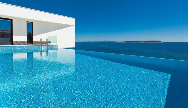 Beachfront Villa Blue Heaven with Pool