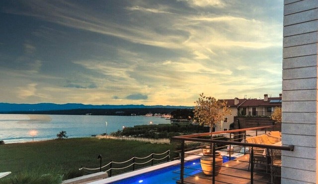 Beachfront Villa Marconica* with a sea view and a pool on Krk