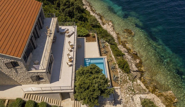 Beachfront Villa Poseidon with Heated Pool