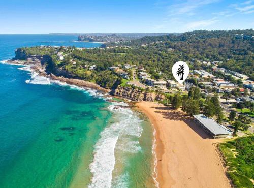 Beachside escape steps from the surf & village