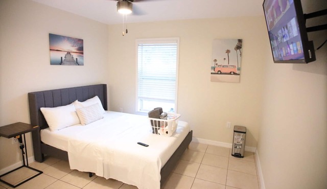 Beachy Oasis Queen Bedroom with Shared Lavatory