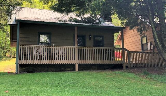 Bear Cave Cabin is perched on a hilltop overlooking Valley Springs lake