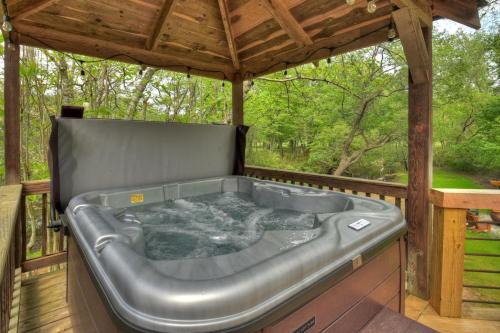 Bear Naked Hideaway - Relax in the hot tub with sounds from the nearby creek