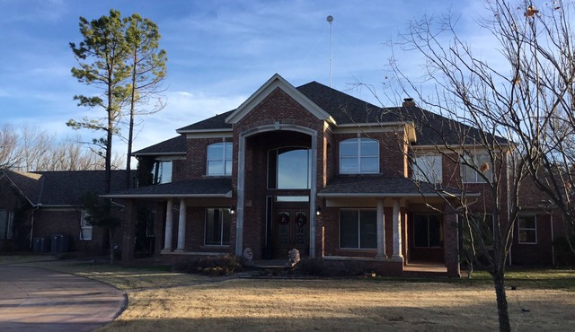 Beautiful 10 acre wooded estate with 4 bedrooms, 4 1/2 baths & private pool.
