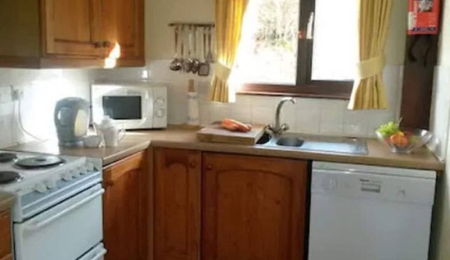 Beautiful 2 bed lodge with hot tub & sauna