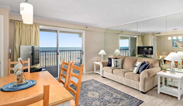 Beautiful 2 bedroom oceanfront condo with adorable coastal decor and free WiFi located directly on the famous Ocean City Boardwalk!