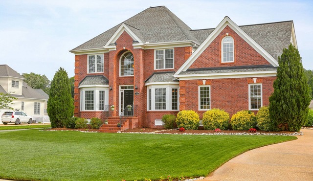 Beautiful 2 story brick home on a cul-de-sac. A beautiful pond in the back yard
