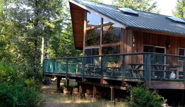 Beautiful 2 story house on Smith River- Private Beach, Trails,& More!
