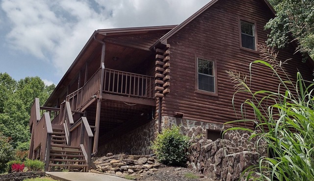 Beautiful 3-bedroom log cabin in wonderful Mooresburg TN on gated 2 plus acres.