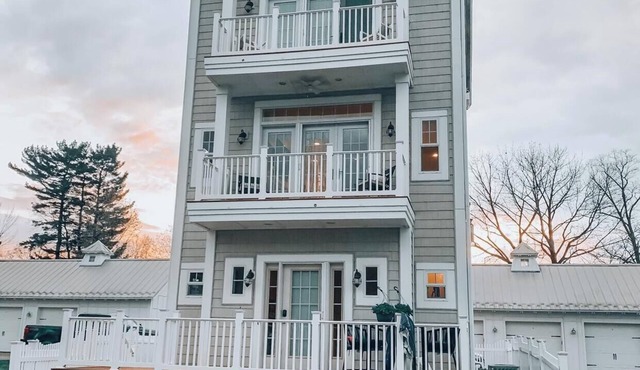 Beautiful 3 story home on the lake, master suite's on 1st & 3rd floors.