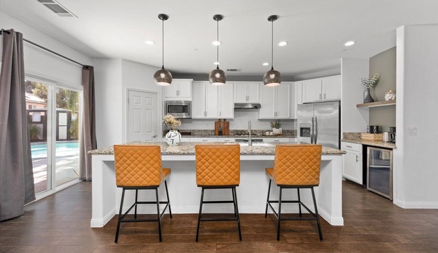 Beautiful 3bd/2bth with fenced yard, pool, and 3 car garage