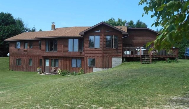 Beautiful 4 BDRM Retreat on Loon Lake with Sauna and Sand Beach!