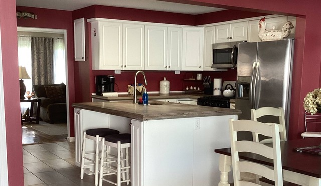 Beautiful 4 bedroom home with large kitchen 1/2 mile to sandy beaches Lake Huron