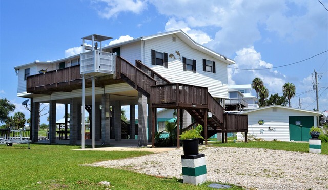 Beautiful 4 bedroom, 3 bath house on the main canal at Keaton Beach Florida.