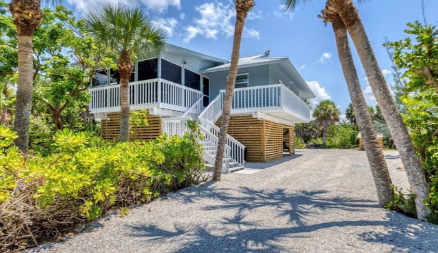 Beautiful 4-bedroom beach home with dock on private island.