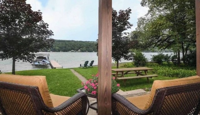 Beautiful 4 bedroom waterfront cottage with dock and fire pit.