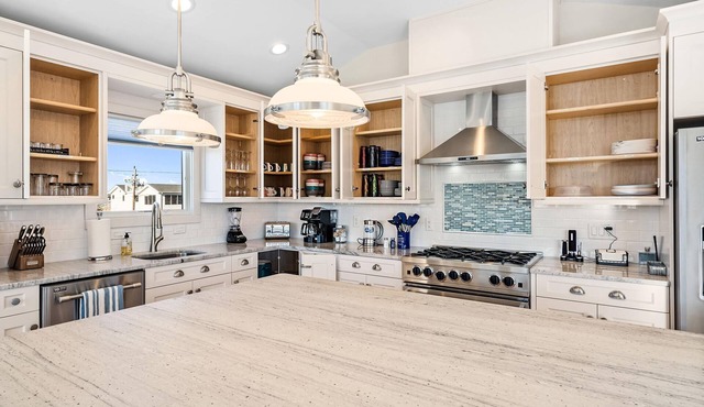 Beautiful 5 Bedroom beach block with swimming pool, decks, indoor/outdoor living