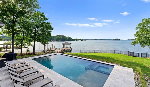Beautiful 5 Bedroom Lake-Front Home with Heated Saltwater Pool, Spa, and Dock