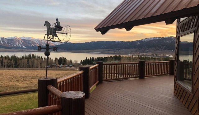 BEAUTIFUL 5 STAR LOG HOME ON 15 ACRES! LAKE VIEWS, STOCKED POND, 18 MILES TO YNP
