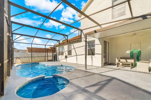 Beautiful 5BR 4 baths Themed home near Disney and Universal, Private Pool, Gameroom, baby Crib and more