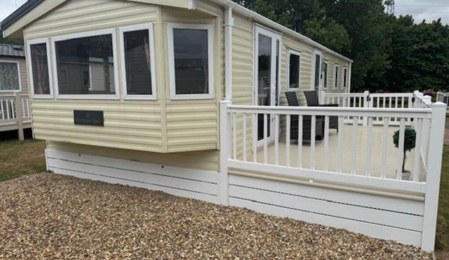 Beautiful 8 berth caravan with decking at Caldecott Park, Norfolk ref 91046C