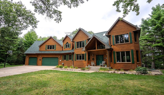 Beautiful 8000 Sq. Ft. Log Home With 250 Feet Of Private Frontage on Kusel Lake