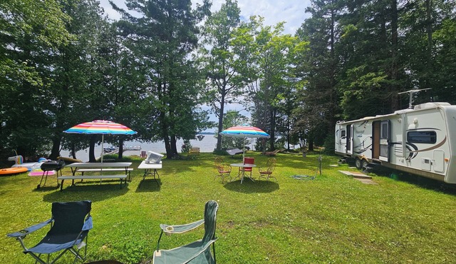 Beautiful 95 ' Waterfront Boasting Sandy Bottom With Dock And 10x12 Sundeck