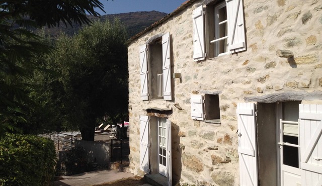 Beautiful air-conditioned character house with large sea view terrace.