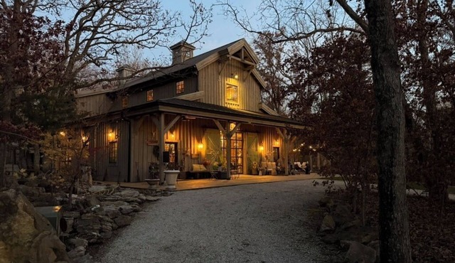 Beautiful barn home nestled in 23 acres of forest.
